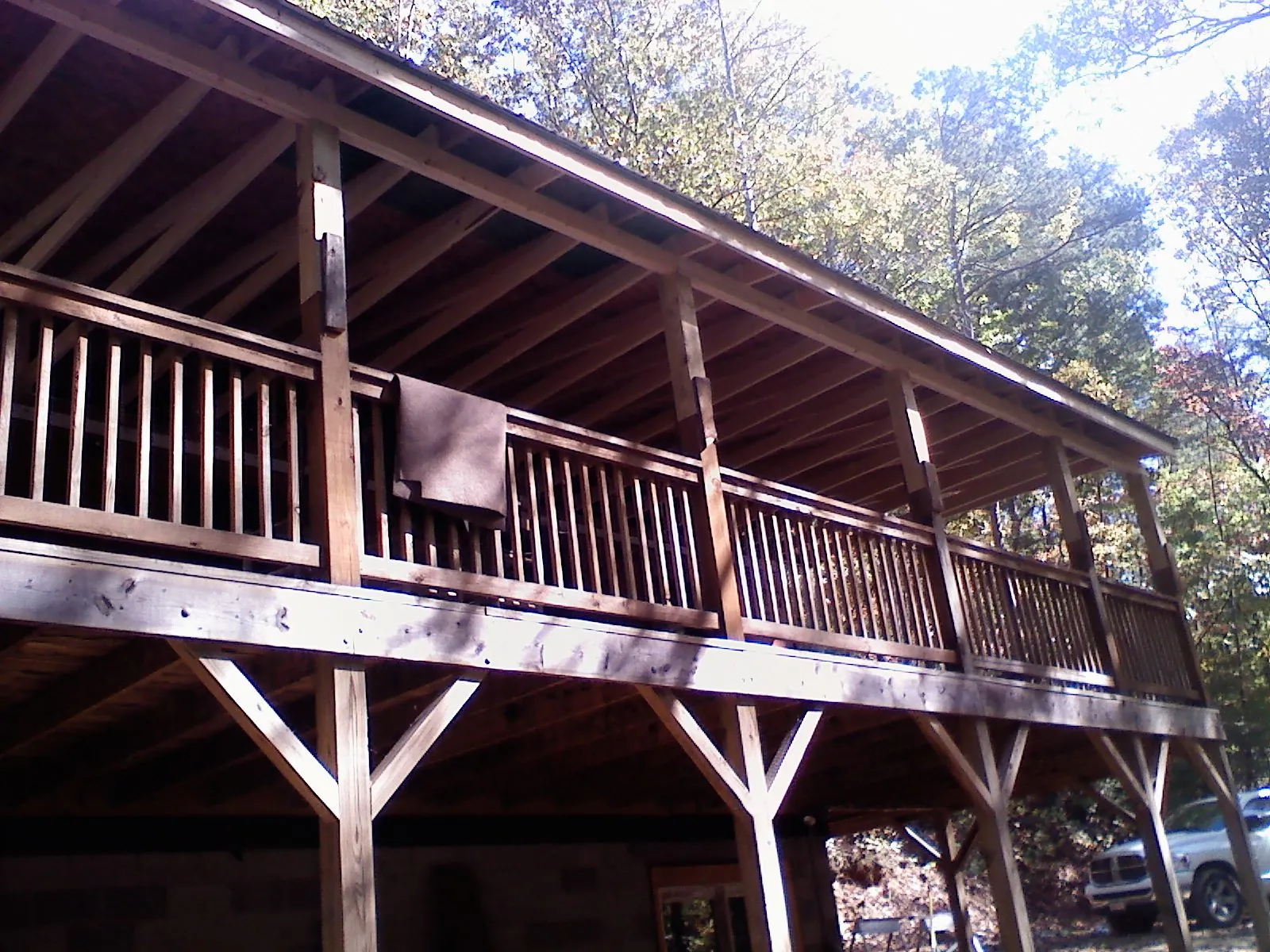 Timber framing under a new elevated porch and deck — Roof Leak Repair in Huntingtown by Roofing Brothers